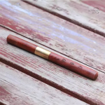 Support encens Xiangdao, design bois poirier et cuivre élégant