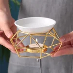 Diffuseur design moderne en métal doré pour ambiance chaleureuse