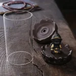 Décoration zen : fontaine d'encens avec motif lotus et singe