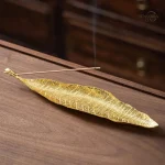Porte-encens bâtons en finition antique, design feuille