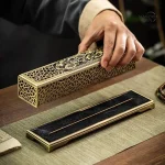 Support pour encens en forme de lotus, finition cuivrée élégante